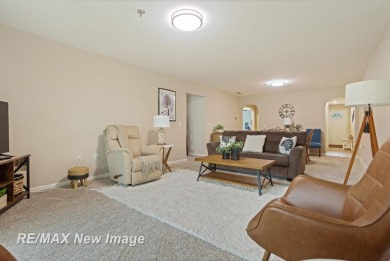 Completely Redone in 2023! This stunning first-floor, end unit on Swan Valley Golf Club in Michigan - for sale on GolfHomes.com, golf home, golf lot