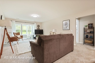 Completely Redone in 2023! This stunning first-floor, end unit on Swan Valley Golf Club in Michigan - for sale on GolfHomes.com, golf home, golf lot