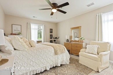Completely Redone in 2023! This stunning first-floor, end unit on Swan Valley Golf Club in Michigan - for sale on GolfHomes.com, golf home, golf lot