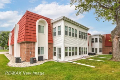 Completely Redone in 2023! This stunning first-floor, end unit on Swan Valley Golf Club in Michigan - for sale on GolfHomes.com, golf home, golf lot
