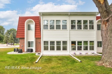 Completely Redone in 2023! This stunning first-floor, end unit on Swan Valley Golf Club in Michigan - for sale on GolfHomes.com, golf home, golf lot