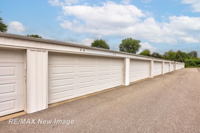 Completely Redone in 2023! This stunning first-floor, end unit on Swan Valley Golf Club in Michigan - for sale on GolfHomes.com, golf home, golf lot