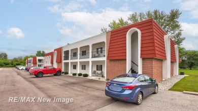 Completely Redone in 2023! This stunning first-floor, end unit on Swan Valley Golf Club in Michigan - for sale on GolfHomes.com, golf home, golf lot