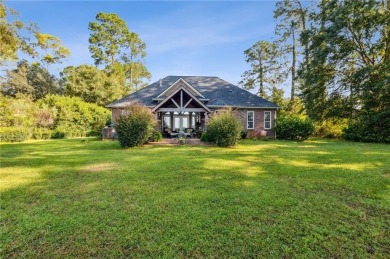 Discover your dream home nestled alongside the stunning 8th hole on The Club At Osprey Cove in Georgia - for sale on GolfHomes.com, golf home, golf lot
