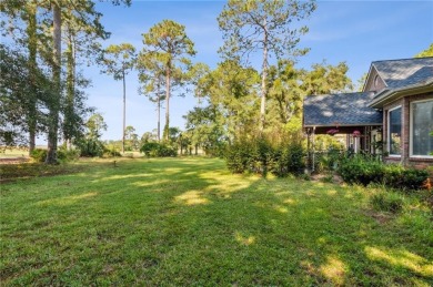 Discover your dream home nestled alongside the stunning 8th hole on The Club At Osprey Cove in Georgia - for sale on GolfHomes.com, golf home, golf lot