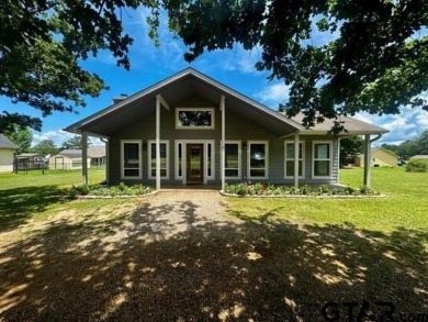 You'll find a wonderful escape from city life in this perfectly on Holly Lake Ranch Golf Club in Texas - for sale on GolfHomes.com, golf home, golf lot