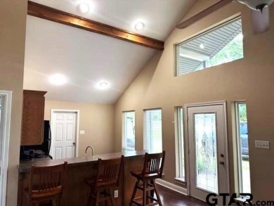 You'll find a wonderful escape from city life in this perfectly on Holly Lake Ranch Golf Club in Texas - for sale on GolfHomes.com, golf home, golf lot