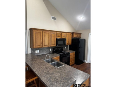 You'll find a wonderful escape from city life in this perfectly on Holly Lake Ranch Golf Club in Texas - for sale on GolfHomes.com, golf home, golf lot