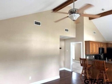 You'll find a wonderful escape from city life in this perfectly on Holly Lake Ranch Golf Club in Texas - for sale on GolfHomes.com, golf home, golf lot