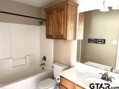 You'll find a wonderful escape from city life in this perfectly on Holly Lake Ranch Golf Club in Texas - for sale on GolfHomes.com, golf home, golf lot