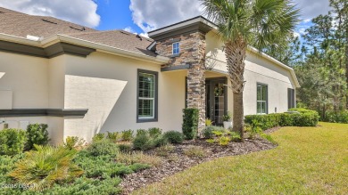 This beautifully maintained 2-bedroom, 2-bath, 2-car garage on Plantation Bay Golf and Country Club in Florida - for sale on GolfHomes.com, golf home, golf lot