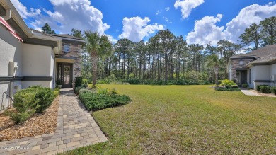 This beautifully maintained 2-bedroom, 2-bath, 2-car garage on Plantation Bay Golf and Country Club in Florida - for sale on GolfHomes.com, golf home, golf lot
