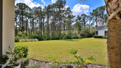 This beautifully maintained 2-bedroom, 2-bath, 2-car garage on Plantation Bay Golf and Country Club in Florida - for sale on GolfHomes.com, golf home, golf lot