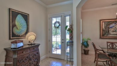 This beautifully maintained 2-bedroom, 2-bath, 2-car garage on Plantation Bay Golf and Country Club in Florida - for sale on GolfHomes.com, golf home, golf lot