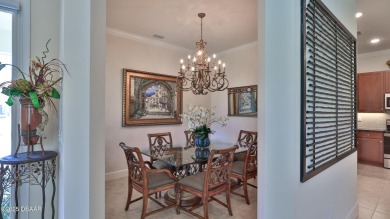 This beautifully maintained 2-bedroom, 2-bath, 2-car garage on Plantation Bay Golf and Country Club in Florida - for sale on GolfHomes.com, golf home, golf lot