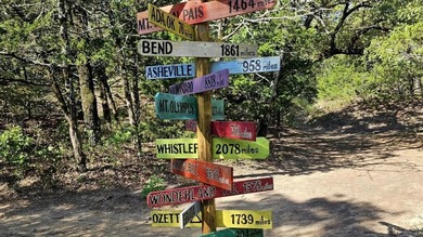 Nestled along a quiet, tree-lined street, this prime homesite on Rock Creek Golf Club in Texas - for sale on GolfHomes.com, golf home, golf lot