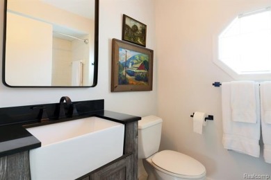 Discover elevated living in this impeccably updated on The Heathers Club in Michigan - for sale on GolfHomes.com, golf home, golf lot