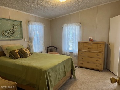SELLERS SAYS BRING OFFERS!A Waterfront 55+ Community! QUICK on Seminole Lakes Country Club in Florida - for sale on GolfHomes.com, golf home, golf lot