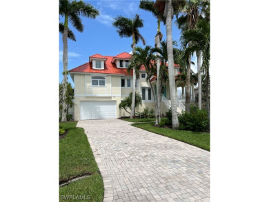 This Stunning residence boasts soaring ceilings & impeccable on Beachview Golf Club in Florida - for sale on GolfHomes.com, golf home, golf lot