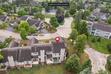 Discover elevated living in this impeccably updated on The Heathers Club in Michigan - for sale on GolfHomes.com, golf home, golf lot