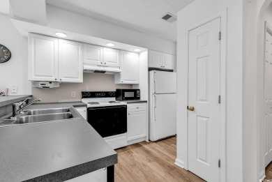 Welcome to your dream retreat! This exquisite top floor end unit on The Valley At Eastport in South Carolina - for sale on GolfHomes.com, golf home, golf lot
