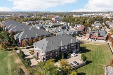 Luxurious Top-Floor Condo with Scenic Views in Iowa City on Elks Lodge 590 in Iowa - for sale on GolfHomes.com, golf home, golf lot