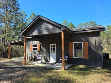 Beautiful 2-bedroom, 2-bath home built in 2024 and tucked away on Rayburn Country Club in Texas - for sale on GolfHomes.com, golf home, golf lot