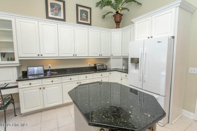 Beautifully maintained custom brick home with steel framed on Ocean Ridge Plantation in North Carolina - for sale on GolfHomes.com, golf home, golf lot