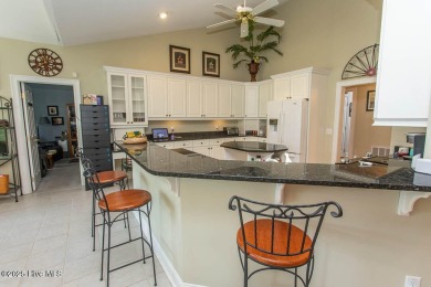 Beautifully maintained custom brick home with steel framed on Ocean Ridge Plantation in North Carolina - for sale on GolfHomes.com, golf home, golf lot