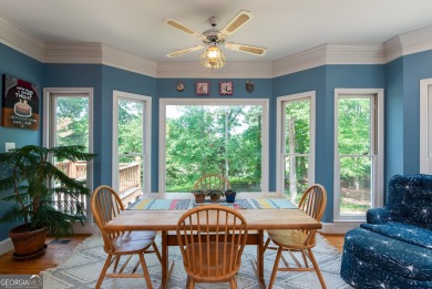 Perched on a slight slope overlooking the 11th fairway of the on Jennings Mill Country Club in Georgia - for sale on GolfHomes.com, golf home, golf lot