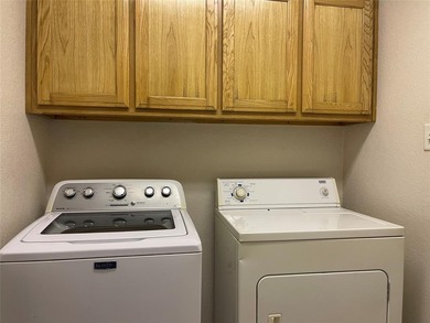 Located in the heart of Runaway Bay, this 4-bedroom, 2-bath home on The Club At Runaway Bay in Texas - for sale on GolfHomes.com, golf home, golf lot