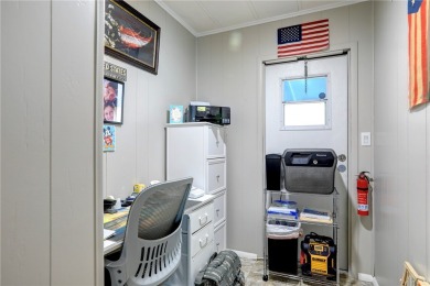 MOTIVATED SELLER! For sale in Barefoot Bay~ This 2 bed 2 bath on Barefoot Bay Golf Course in Florida - for sale on GolfHomes.com, golf home, golf lot