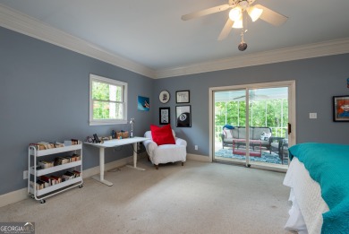 Perched on a slight slope overlooking the 11th fairway of the on Jennings Mill Country Club in Georgia - for sale on GolfHomes.com, golf home, golf lot
