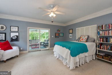 Perched on a slight slope overlooking the 11th fairway of the on Jennings Mill Country Club in Georgia - for sale on GolfHomes.com, golf home, golf lot