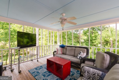 Perched on a slight slope overlooking the 11th fairway of the on Jennings Mill Country Club in Georgia - for sale on GolfHomes.com, golf home, golf lot