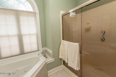 Beautifully maintained custom brick home with steel framed on Ocean Ridge Plantation in North Carolina - for sale on GolfHomes.com, golf home, golf lot