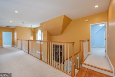 Perched on a slight slope overlooking the 11th fairway of the on Jennings Mill Country Club in Georgia - for sale on GolfHomes.com, golf home, golf lot