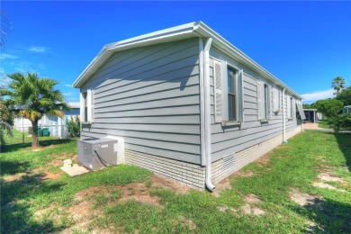 MOTIVATED SELLER! For sale in Barefoot Bay~ This 2 bed 2 bath on Barefoot Bay Golf Course in Florida - for sale on GolfHomes.com, golf home, golf lot