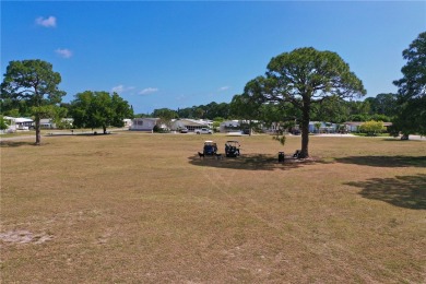 MOTIVATED SELLER! For sale in Barefoot Bay~ This 2 bed 2 bath on Barefoot Bay Golf Course in Florida - for sale on GolfHomes.com, golf home, golf lot