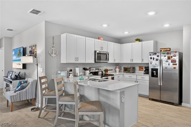 Enjoy relaxing mornings and peaceful evenings from your private on Herons Glen Golf and Country Club in Florida - for sale on GolfHomes.com, golf home, golf lot