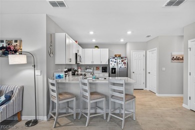 Enjoy relaxing mornings and peaceful evenings from your private on Herons Glen Golf and Country Club in Florida - for sale on GolfHomes.com, golf home, golf lot