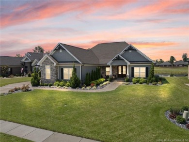 Nestled on a breathtaking 0.43-acre estate lot in the on Champions Pointe Golf Course in Indiana - for sale on GolfHomes.com, golf home, golf lot