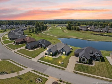 Nestled on a breathtaking 0.43-acre estate lot in the on Champions Pointe Golf Course in Indiana - for sale on GolfHomes.com, golf home, golf lot