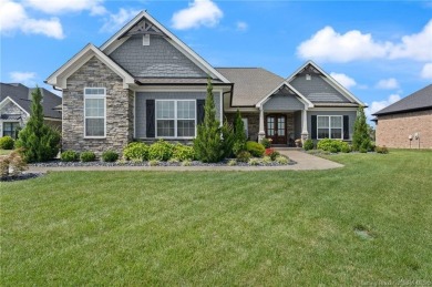 Nestled on a breathtaking 0.43-acre estate lot in the on Champions Pointe Golf Course in Indiana - for sale on GolfHomes.com, golf home, golf lot