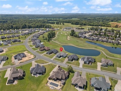 Nestled on a breathtaking 0.43-acre estate lot in the on Champions Pointe Golf Course in Indiana - for sale on GolfHomes.com, golf home, golf lot