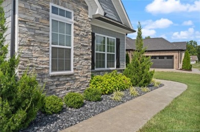 Nestled on a breathtaking 0.43-acre estate lot in the on Champions Pointe Golf Course in Indiana - for sale on GolfHomes.com, golf home, golf lot