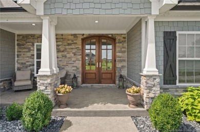 Nestled on a breathtaking 0.43-acre estate lot in the on Champions Pointe Golf Course in Indiana - for sale on GolfHomes.com, golf home, golf lot