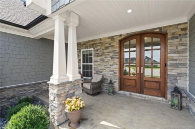 Nestled on a breathtaking 0.43-acre estate lot in the on Champions Pointe Golf Course in Indiana - for sale on GolfHomes.com, golf home, golf lot
