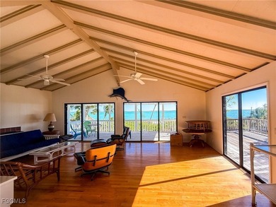 Rare Bayfront Fixer Upper!Impressive panoramic big water views on Captiva Island Golf Club in Florida - for sale on GolfHomes.com, golf home, golf lot