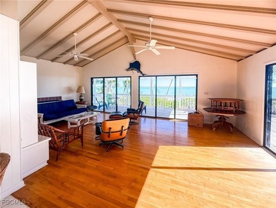 Rare Bayfront Fixer Upper!Impressive panoramic big water views on Captiva Island Golf Club in Florida - for sale on GolfHomes.com, golf home, golf lot